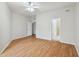 Empty bedroom with two door ways and hardwood flooring throughout at 119 Beach Haven Ln, Tampa, FL 33609