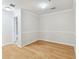 Bedroom with hardwood floors, neutral walls, and bright natural light at 119 Beach Haven Ln, Tampa, FL 33609