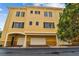 Attractive multi-story building includes private garages and many windows bringing in natural light at 119 Beach Haven Ln, Tampa, FL 33609
