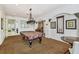 Well-lit game room featuring a traditional pool table and ample space for recreation at 119 Beach Haven Ln, Tampa, FL 33609