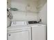 Close up of the laundry room, which features a washer and dryer at 119 Beach Haven Ln, Tampa, FL 33609