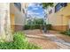 Designated pet area with waste station and seating within the community at 119 Beach Haven Ln, Tampa, FL 33609