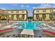 Beautiful community pool featuring clear water, lounge seating and manicured landscaping in a sunny setting at 119 Beach Haven Ln, Tampa, FL 33609