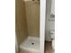 Shower with tile surround at 125 Grand Beach Pl # 125, Tampa, FL 33609