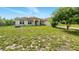 Charming single-story home featuring a well-maintained lawn and inviting curb appeal at 15348 Glossy Ibis Rd, Weeki Wachee, FL 34614