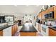 Bright, open kitchen with sleek countertops, modern appliances, and lots of counter space at 15348 Glossy Ibis Rd, Weeki Wachee, FL 34614
