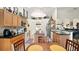 Well-lit kitchen boasts granite countertops, ample cabinet space, and stainless steel appliances at 15348 Glossy Ibis Rd, Weeki Wachee, FL 34614