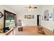 Bright living room boasting vaulted ceilings, large windows, tile floors, and neutral paint at 15348 Glossy Ibis Rd, Weeki Wachee, FL 34614