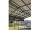 Covered outdoor structure with open sides and a metal roof at 15348 Glossy Ibis Rd, Weeki Wachee, FL 34614