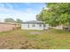 Spacious backyard view showcasing the back exterior of the home at 1713 W Saint John St, Tampa, FL 33607