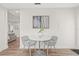 Cozy dining area with modern table, seating for two, and natural light at 1713 W Saint John St, Tampa, FL 33607