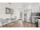 Bright kitchen area with new stainless steel appliances and a cozy breakfast table at 1713 W Saint John St, Tampa, FL 33607
