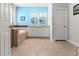 Bright bathroom with a double vanity, soaking tub, framed mirrors, and modern fixtures at 18620 Rococo Rd, Spring Hill, FL 34610