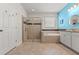 Well-lit bathroom with a walk-in shower, separate soaking tub, and a modern vanity with double sinks at 18620 Rococo Rd, Spring Hill, FL 34610