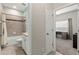 Bright bathroom features a granite countertop, tile flooring, and shower-tub combo at 18620 Rococo Rd, Spring Hill, FL 34610