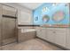 Stylish bathroom features a walk-in shower, soaking tub, granite countertops, and double vanity sinks at 18620 Rococo Rd, Spring Hill, FL 34610