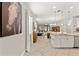 Modern kitchen featuring an island with a sink, granite countertops, and stainless steel appliances at 18620 Rococo Rd, Spring Hill, FL 34610