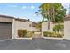 Inviting courtyard entrance with mature landscaping and a tranquil garden setting, perfect for relaxation at 1881 N Hercules Ave # 602, Clearwater, FL 33765