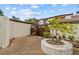 Private courtyard featuring a decorative planter and access to the townhome at 1881 N Hercules Ave # 602, Clearwater, FL 33765