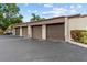 Row of garages offering secure parking and storage for residents and visitors at 1881 N Hercules Ave # 602, Clearwater, FL 33765