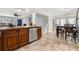 Open kitchen with stainless steel appliances, granite countertops, and tile flooring at 1881 N Hercules Ave # 602, Clearwater, FL 33765