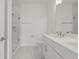 Elegant bathroom with glass shower enclosure and dual sink vanity at 303 15Th N St, St Petersburg, FL 33705