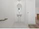 Clean, modern powder room with pedestal sink and white marble-style flooring at 303 15Th N St, St Petersburg, FL 33705