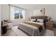 Cozy staged bedroom with plush bedding and neutral decor at 303 15Th N St, St Petersburg, FL 33705