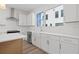 Bright kitchen featuring white countertops, stainless steel appliances, and ample natural light at 303 15Th N St, St Petersburg, FL 33705