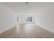 Open-concept living room with lots of light and luxury vinyl plank flooring at 303 15Th N St, St Petersburg, FL 33705