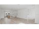 Spacious living room and kitchen area with light wood floors and modern finishes at 303 15Th N St, St Petersburg, FL 33705