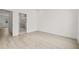 Bright room with light wood floors, access to a shower room, white trim and walls, with open doorway at 321 15Th N St, St Petersburg, FL 33705