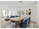 Stylishly designed dining area featuring modern furniture and decor with an open-concept living space at 321 15Th N St, St Petersburg, FL 33705