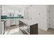 Modern kitchen with a center island, stainless steel appliances, and a large window at 321 15Th N St, St Petersburg, FL 33705