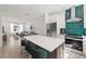 Open concept kitchen with center island, seating, and stainless steel appliances at 321 15Th N St, St Petersburg, FL 33705