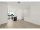 Bright, open-concept kitchen features a center island, stainless steel appliances, and sleek, modern finishes at 321 15Th N St, St Petersburg, FL 33705