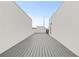 Open-air roof deck between walls, providing a private and relaxing outdoor space at 321 15Th N St, St Petersburg, FL 33705