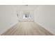 An empty room featuring sleek flooring and large windows providing ample natural light at 321 15Th N St, St Petersburg, FL 33705