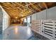 Spacious garage with ample storage, workbench, and plenty of room for projects and parking at 3312 Holly Springs Dr, Hernando Beach, FL 34607