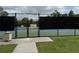 Outdoor tennis courts in a fenced-in area at the community recreation facilities at 4227 Bethpage Ct, Wesley Chapel, FL 33543