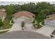 An aerial view of two-car garage homes with pristine landscaping at 4228 Silver Star Dr, Spring Hill, FL 34609