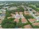 An aerial view of a residential community with manicured lawns and landscaping at 4228 Silver Star Dr, Spring Hill, FL 34609