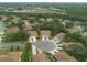 An aerial view of a residential community with manicured lawns and landscaping at 4228 Silver Star Dr, Spring Hill, FL 34609