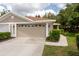 Charming home with a well-maintained lawn and a two-car garage at 4228 Silver Star Dr, Spring Hill, FL 34609