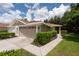 Charming home with a well-maintained lawn and a two-car garage at 4228 Silver Star Dr, Spring Hill, FL 34609