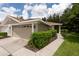 Charming single-story home with a well-maintained lawn and a two car garage at 4228 Silver Star Dr, Spring Hill, FL 34609