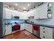 Kitchen with white cabinets, stainless appliances, and ample counter space at 4228 Silver Star Dr, Spring Hill, FL 34609