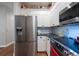 Modern kitchen with stainless steel appliances and ample countertop space at 4228 Silver Star Dr, Spring Hill, FL 34609