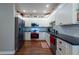 Updated kitchen with white cabinetry, stainless appliances, and modern fixtures at 4228 Silver Star Dr, Spring Hill, FL 34609