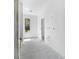 Unfinished room shows potential with ample space, a window with natural light, and exposed utility connections at 4261 Burns Rd, Brooksville, FL 34602